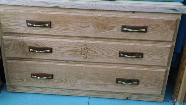 Oak shoe cabinet with carved flower detail and brass handles on Bloodwood bases by Mike G at The Master’s Workshop of WI