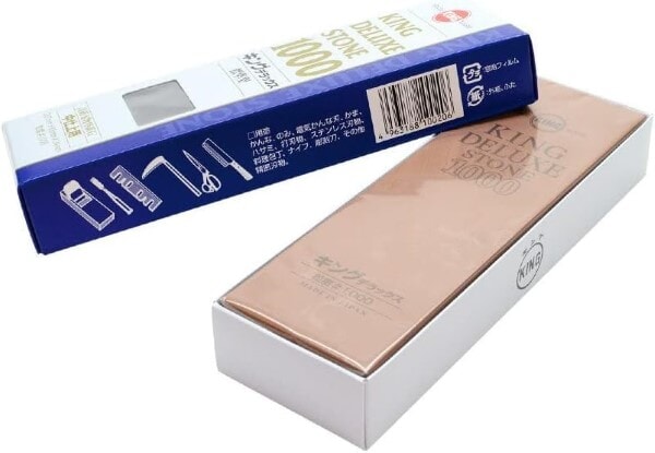 King Deluxe 1000-grit sharpening stone shown with its blue and white packaging.